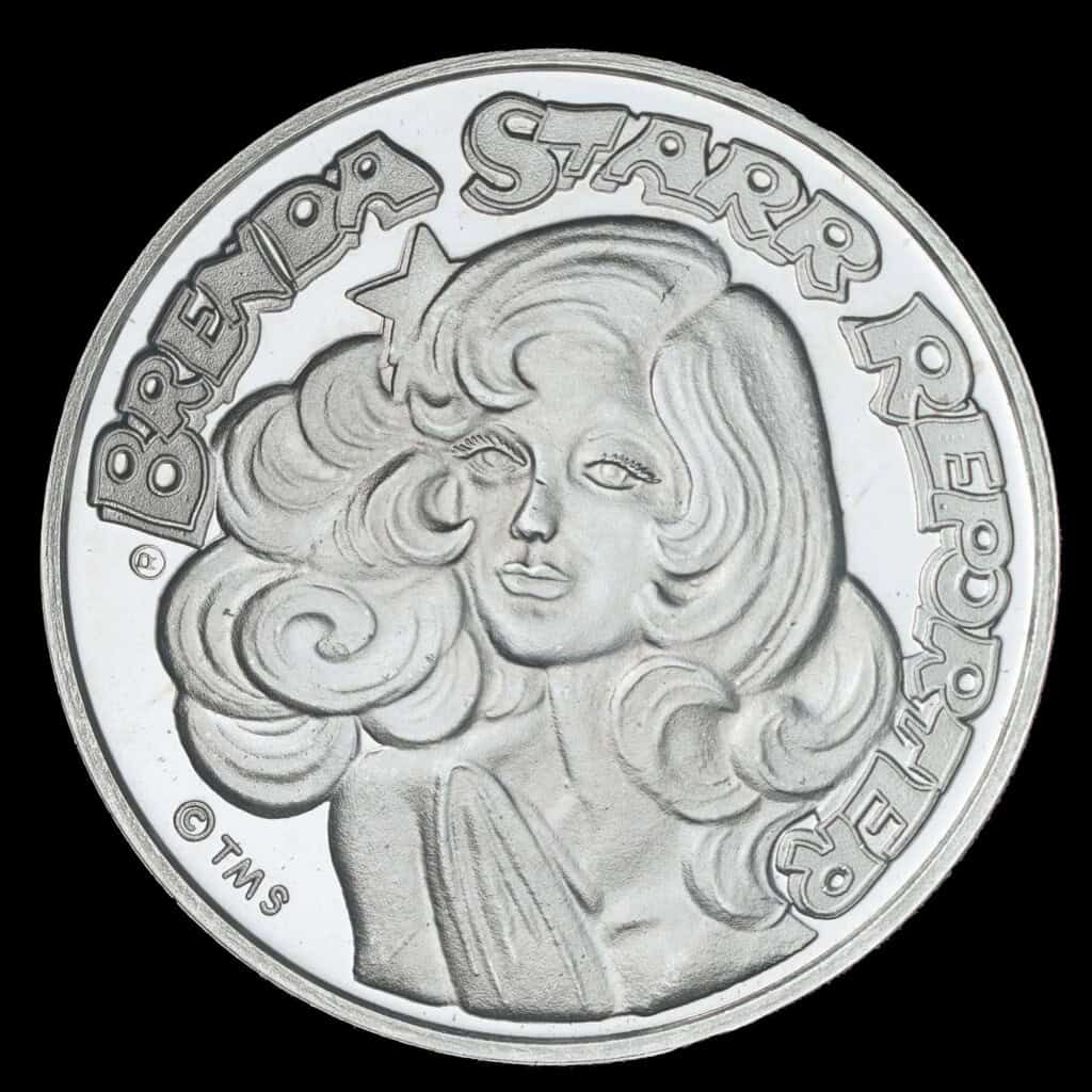 1987 Brenda Starr Reporter AMC Cartoon Celebrities Silver Round Obverse